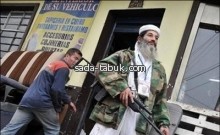 كولومبي يقلد شكل بن لادن في شوارع كولومبيا 