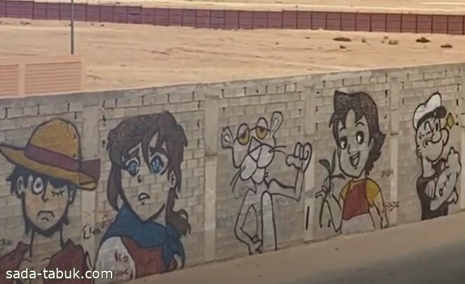 رسام سعودي يحول جدران حي بالرياض إلى لوحات فنية تنطق فناً (فيديو)